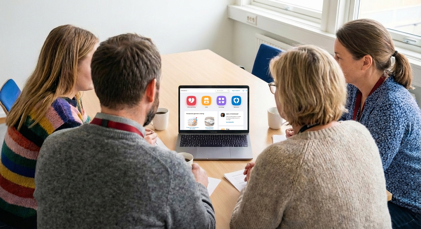 Bilde av kommuneansatte som ser på Veilederen.no